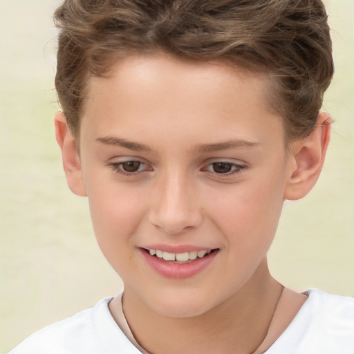 Joyful white child male with short  brown hair and brown eyes