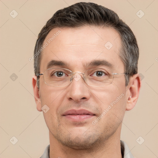 Joyful white adult male with short  brown hair and brown eyes