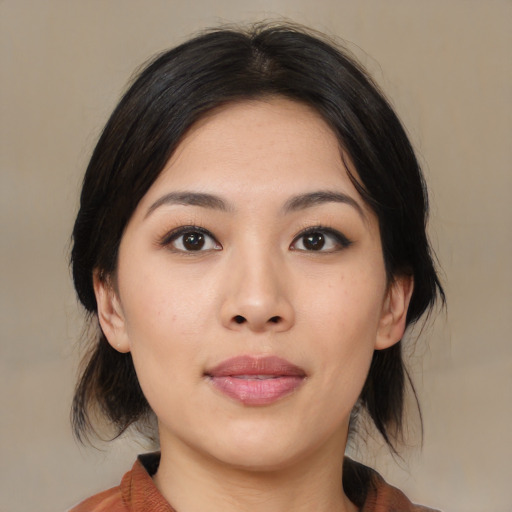 Neutral asian young-adult female with medium  brown hair and brown eyes