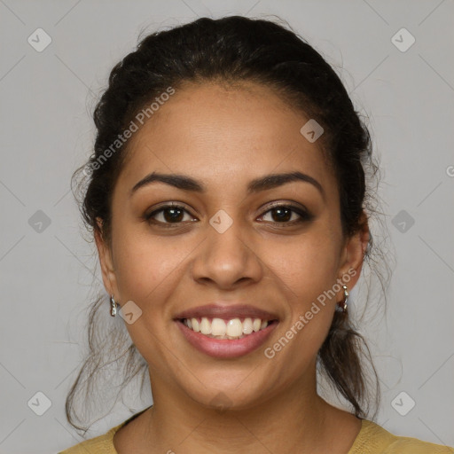 Joyful latino young-adult female with medium  brown hair and brown eyes