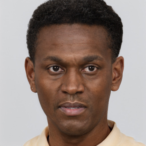 Neutral black young-adult male with short  brown hair and brown eyes