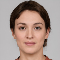 Neutral white young-adult female with short  brown hair and brown eyes