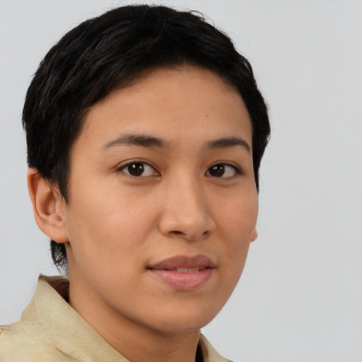 Joyful latino young-adult female with short  brown hair and brown eyes