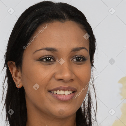 Joyful black young-adult female with long  brown hair and brown eyes