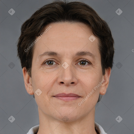 Joyful white adult female with short  brown hair and brown eyes