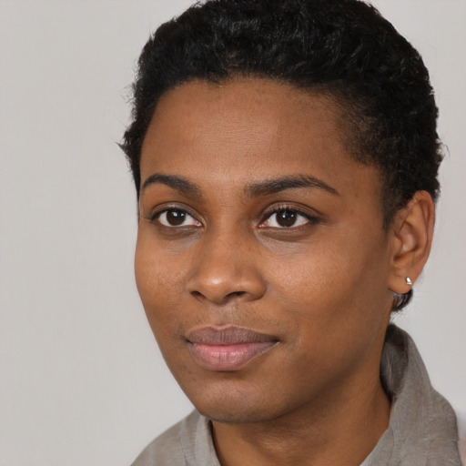 Neutral black young-adult female with short  black hair and brown eyes