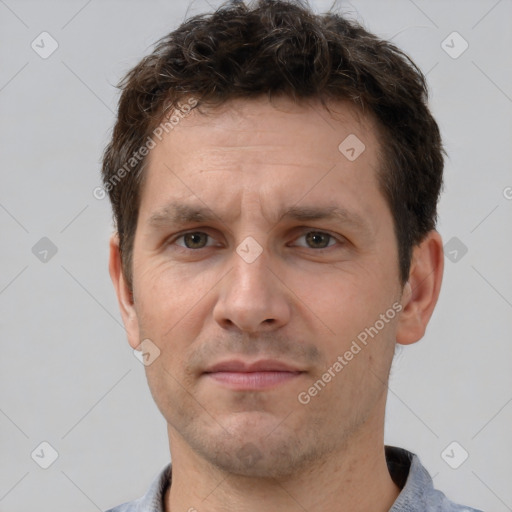 Neutral white adult male with short  brown hair and brown eyes