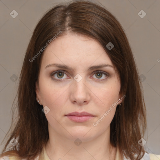 Neutral white young-adult female with medium  brown hair and brown eyes