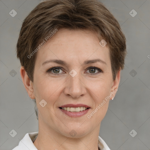 Joyful white young-adult female with short  brown hair and grey eyes