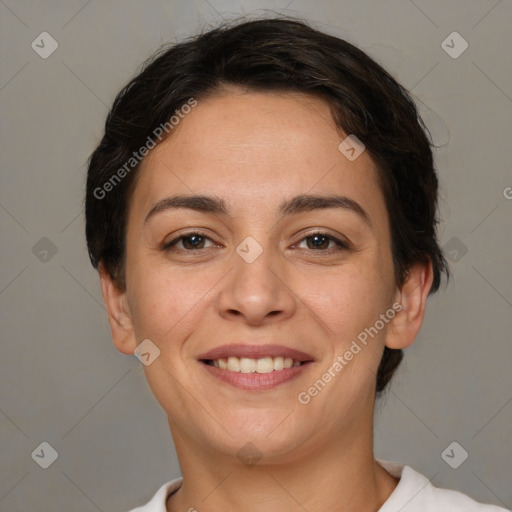 Joyful white young-adult female with short  brown hair and brown eyes