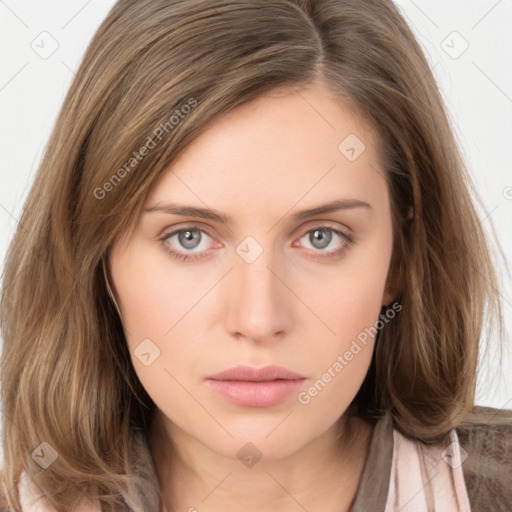 Neutral white young-adult female with long  brown hair and grey eyes