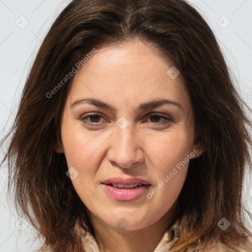 Joyful white adult female with long  brown hair and brown eyes