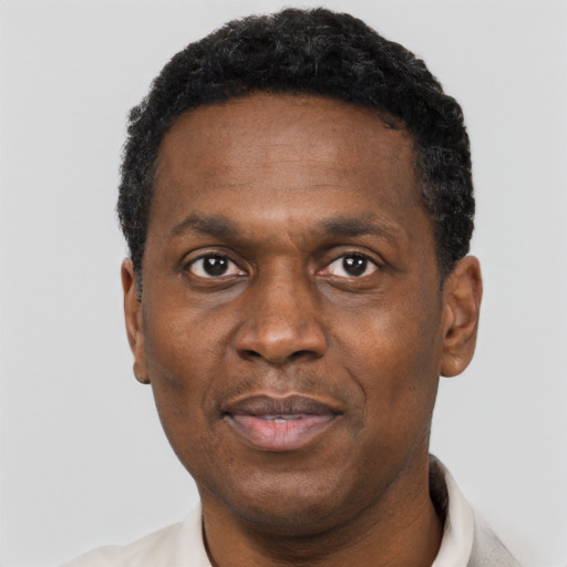 Neutral black adult male with short  black hair and brown eyes