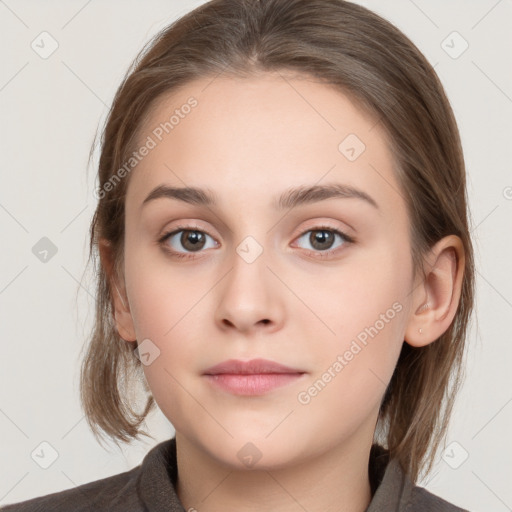 Neutral white young-adult female with medium  brown hair and brown eyes