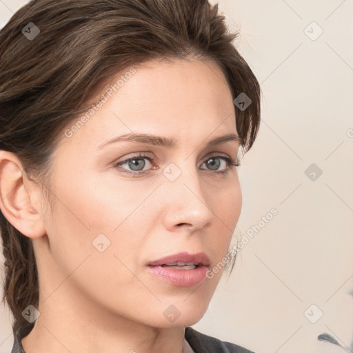 Neutral white young-adult female with medium  brown hair and grey eyes