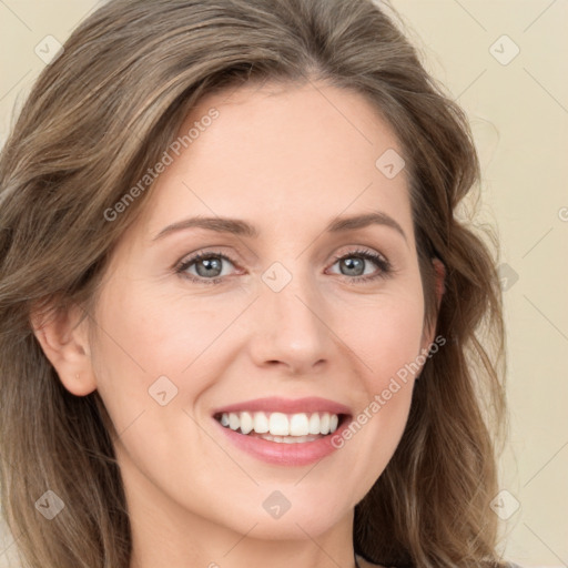 Joyful white young-adult female with long  brown hair and green eyes