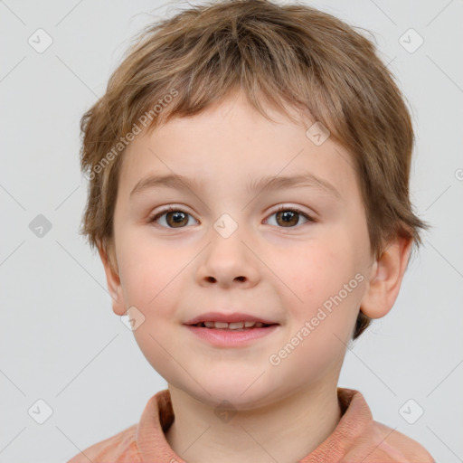 Joyful white child male with short  brown hair and brown eyes