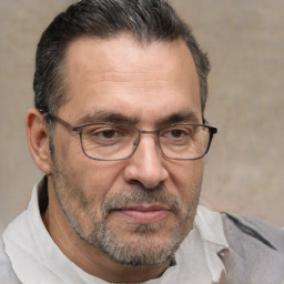 Joyful white middle-aged male with short  brown hair and brown eyes