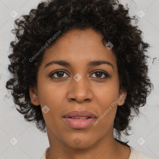 Joyful black young-adult female with medium  brown hair and brown eyes