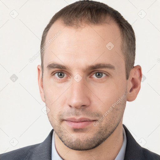 Neutral white young-adult male with short  brown hair and brown eyes