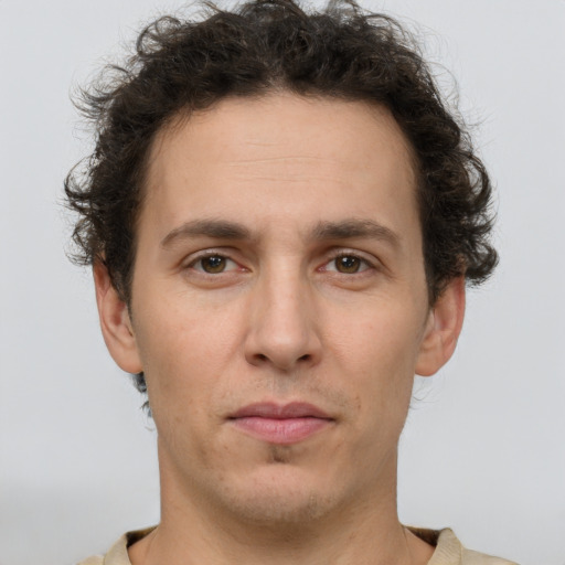 Neutral white adult male with short  brown hair and brown eyes