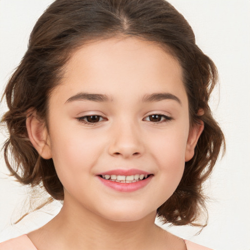 Joyful white child female with medium  brown hair and brown eyes