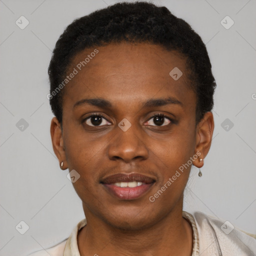 Joyful black young-adult female with short  black hair and brown eyes