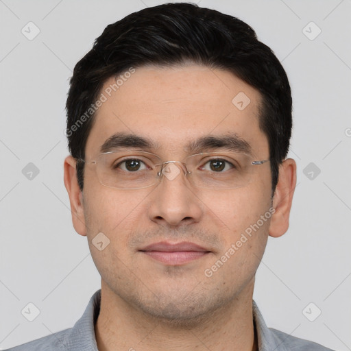 Joyful white young-adult male with short  black hair and brown eyes