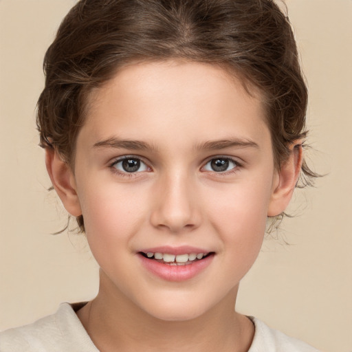 Joyful white child female with medium  brown hair and brown eyes