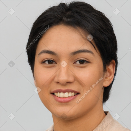 Joyful asian young-adult female with short  brown hair and brown eyes