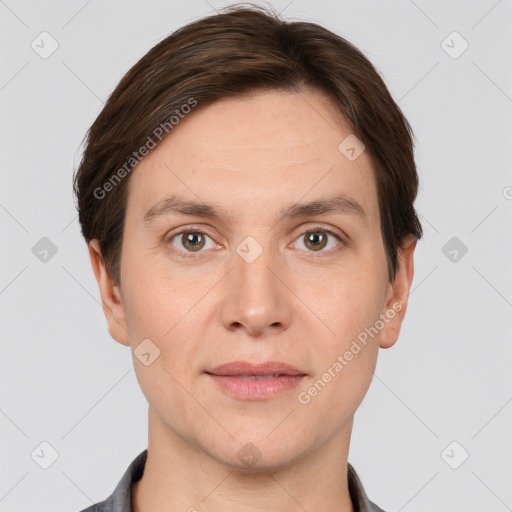 Joyful white adult male with short  brown hair and grey eyes