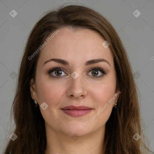 Joyful white young-adult female with long  brown hair and green eyes