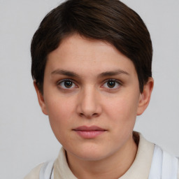 Neutral white young-adult female with short  brown hair and brown eyes