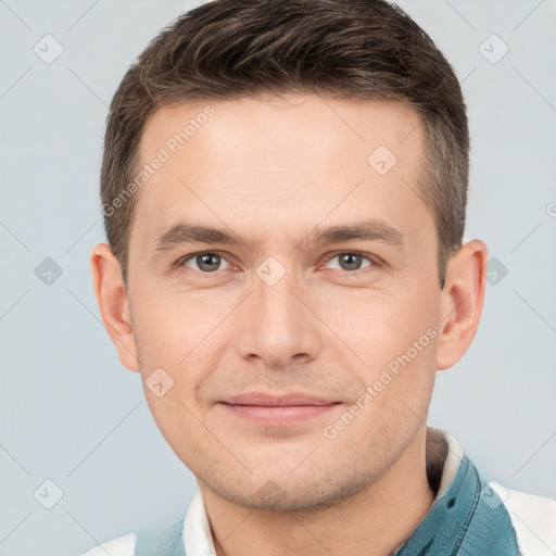 Joyful white young-adult male with short  brown hair and brown eyes