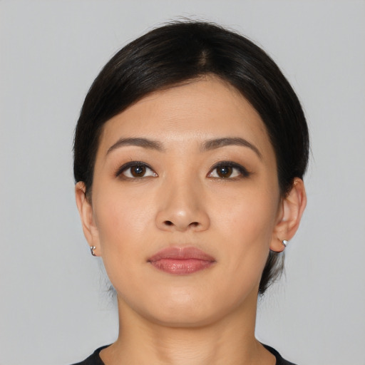 Neutral asian young-adult female with short  black hair and brown eyes