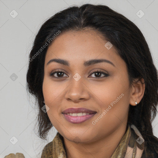 Joyful latino young-adult female with long  brown hair and brown eyes