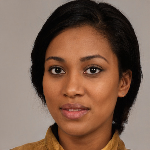 Joyful latino young-adult female with medium  black hair and brown eyes