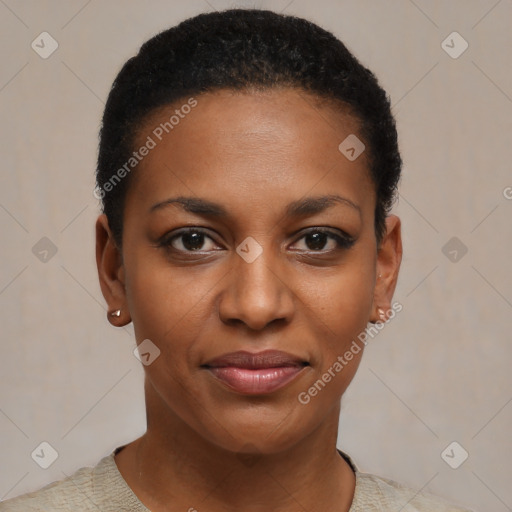 Joyful black young-adult female with short  black hair and brown eyes