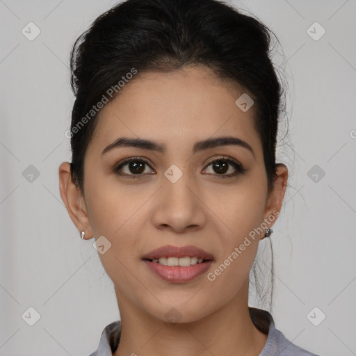 Joyful latino young-adult female with short  brown hair and brown eyes