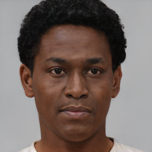 Neutral black young-adult male with short  brown hair and brown eyes
