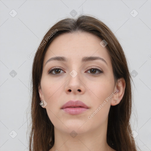 Neutral white young-adult female with long  brown hair and brown eyes