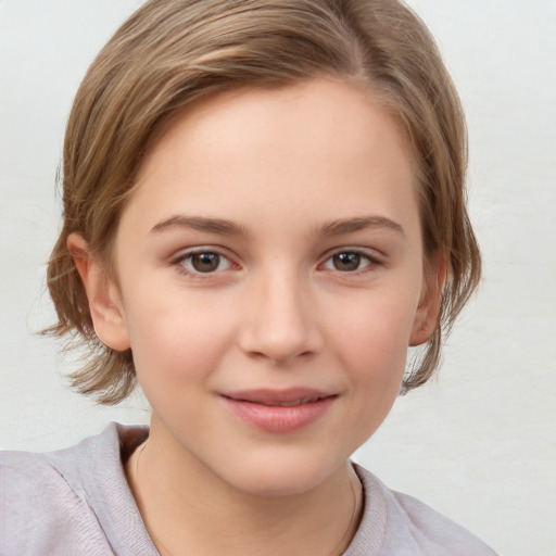 Joyful white child female with medium  brown hair and brown eyes