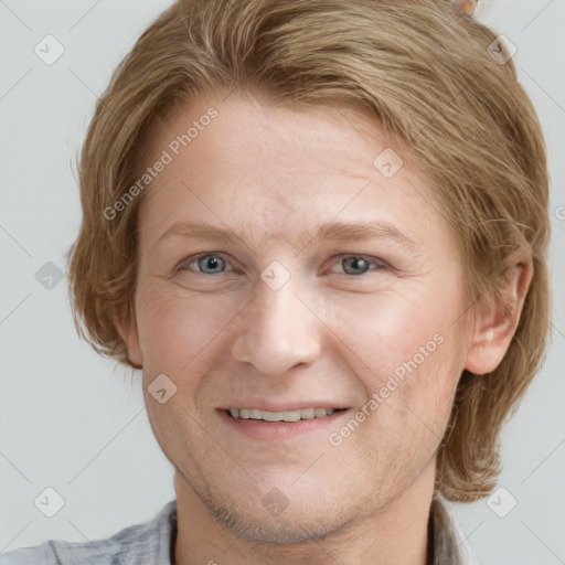 Joyful white adult female with short  brown hair and grey eyes