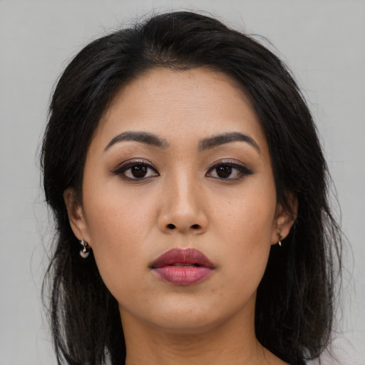 Neutral asian young-adult female with long  black hair and brown eyes