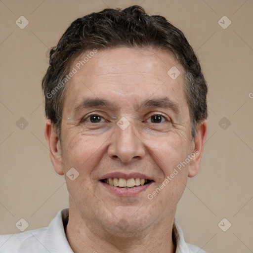 Joyful white adult male with short  brown hair and brown eyes