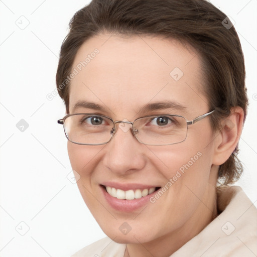 Joyful white adult female with short  brown hair and brown eyes