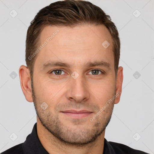 Joyful white adult male with short  brown hair and brown eyes