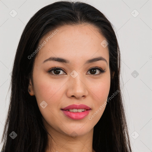 Joyful asian young-adult female with long  brown hair and brown eyes