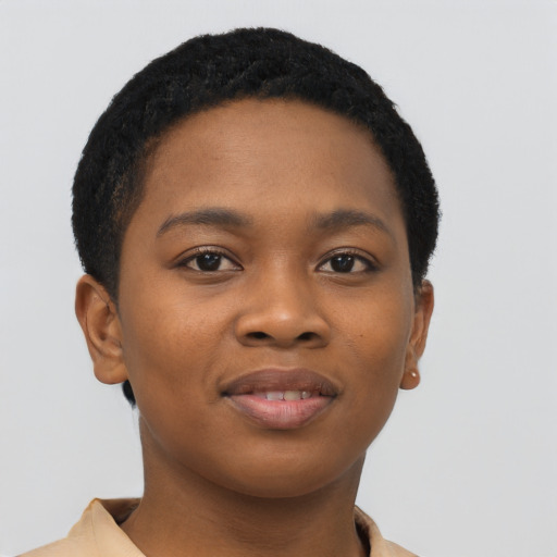 Joyful black young-adult female with short  black hair and brown eyes