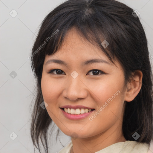 Joyful asian young-adult female with medium  brown hair and brown eyes